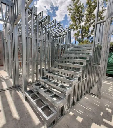 Modern pre-engineered steel building constructed by a professional PEB contractor in Bangalore cityscape.